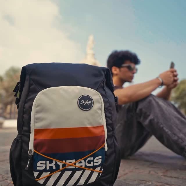 Instagram post by @agamjindal_1 for Skybags. Caption reads: *Skybags YOLO*
Level up your style with the....