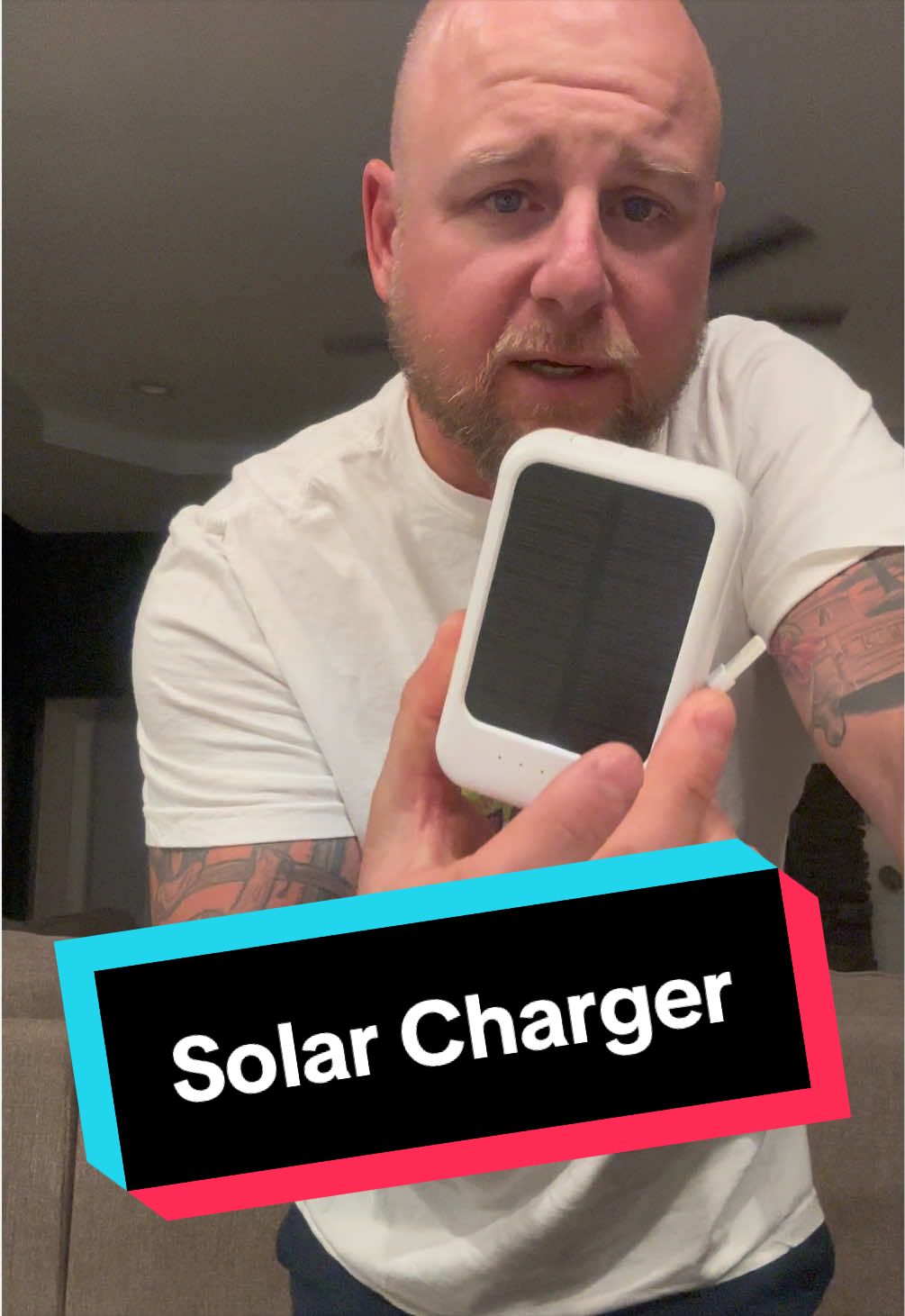 TikTok post by @theofficialkingryan for JoyTutus. Caption reads: @JOYTUTUS #solarcharger #portablecharger [...].