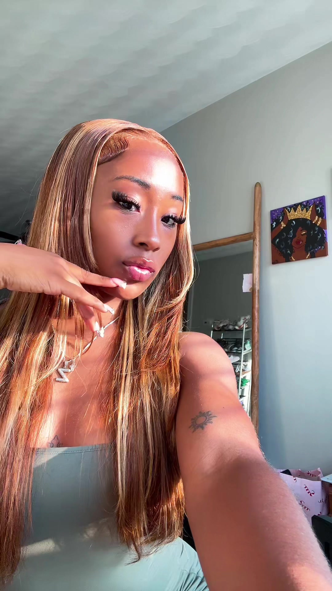 TikTok post by @zoeeoliviaa_ for OQHAIR. Caption reads: so in lovee w this colorr omg. @OQHAIR #foryou....