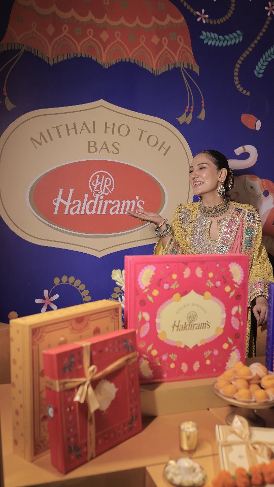 Instagram post by @momwearsprada for Haldiram's. Caption reads: [...] boxes at Haldiram’s outlets or on....