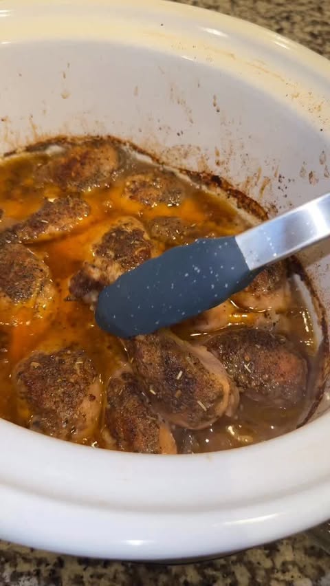 Instagram post by @cookinwithmegg for Bloom Nutrition. Caption reads: Chicken legs in the crock pot washed down with....