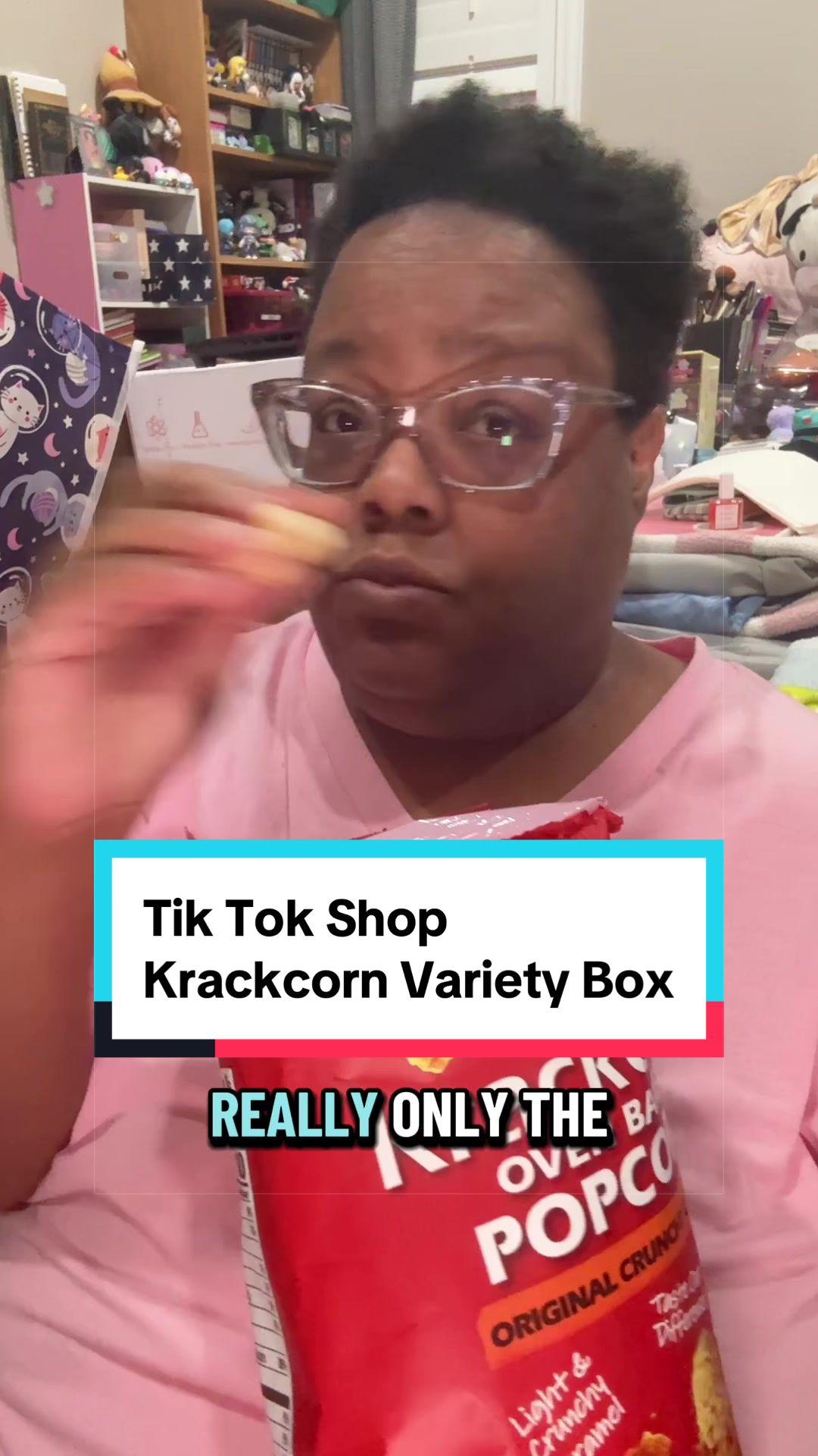 TikTok post by @midnightpursona for KrackCorn Popcorn. Caption reads: @KrackCorn Popcorn is so good! I love the cheesy....
