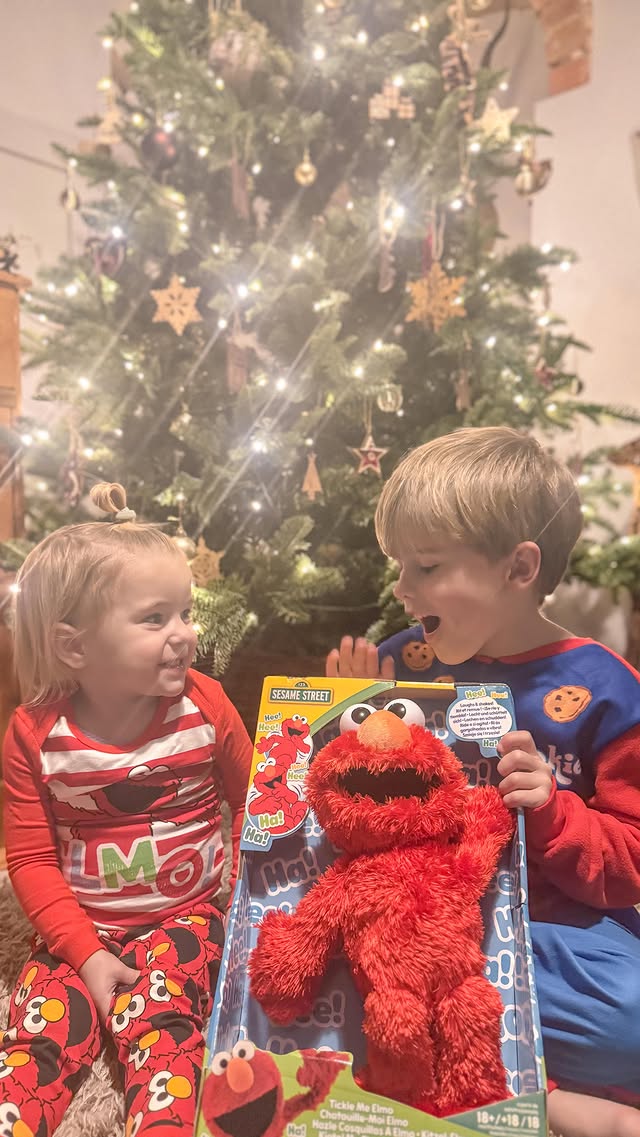 Instagram post by @our.rural.life for Sesame Street. Caption reads: A D // We all love Sesame Street Tickle Me Elmo....