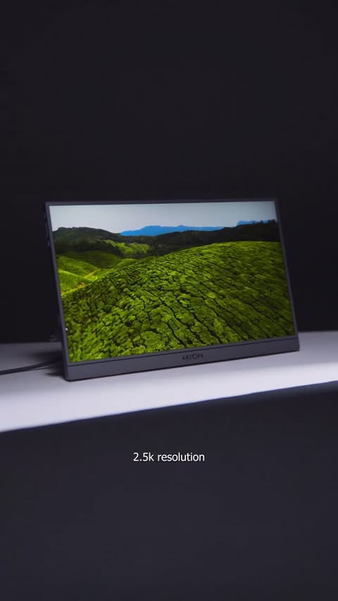Instagram post by @ogrobbytv for ARZOPA. Caption reads: Need a Portable 180hz monitor? @arzopa_official....
