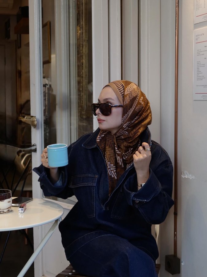 Instagram post by @suhedaaat for Imannoor. Caption reads: Weekend mood: oversized denim + strong coffee....