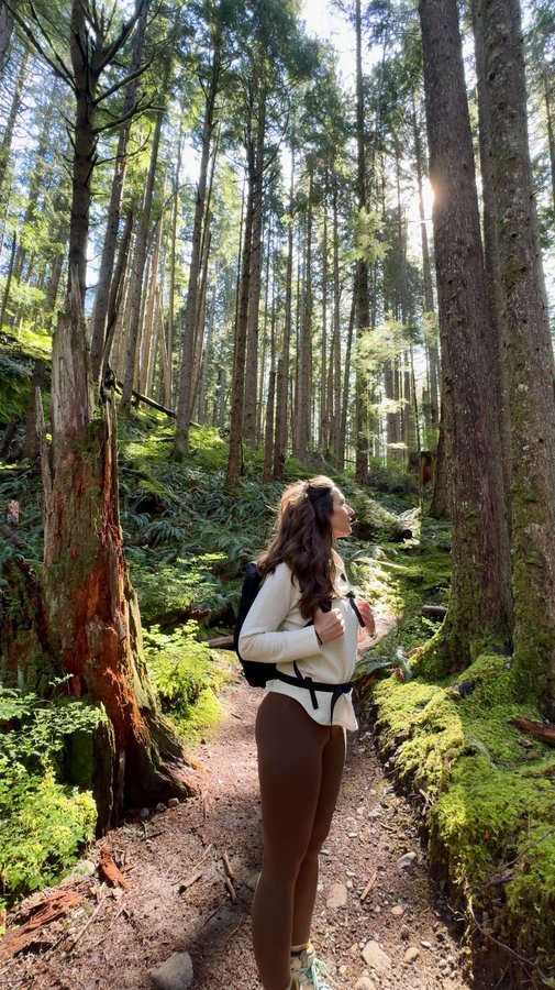 Instagram post by @missholldoll for Free Country. Caption reads: Come with me on a quick Washington hike! While I....