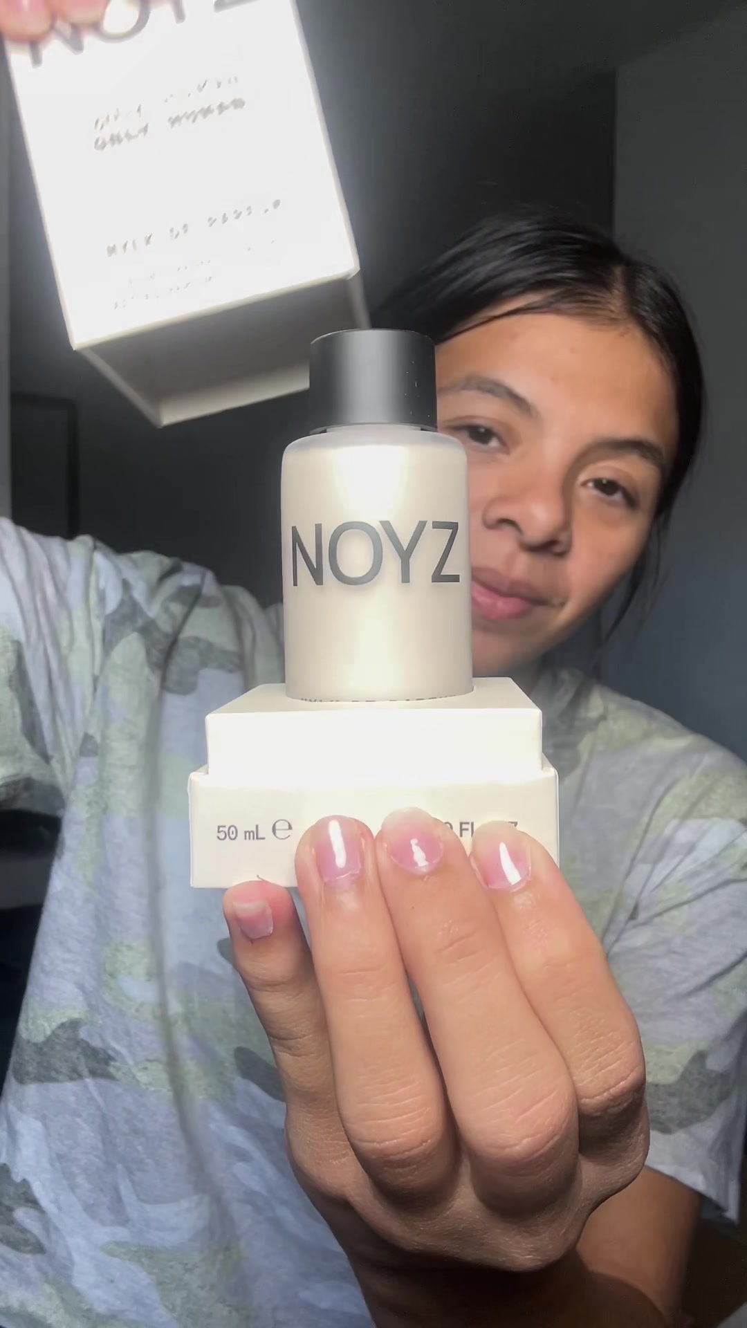 TikTok post by @definitelynotdrana for NOYZ. Caption reads: [...] perfume but in MILK FORM....