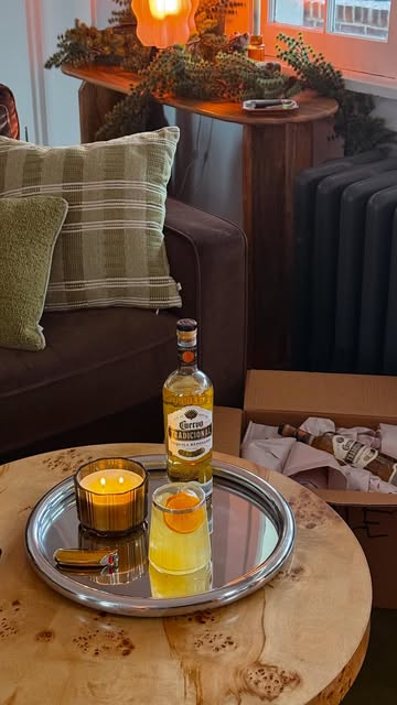 Instagram post by @drinksbyevie for Jose Cuervo USA. Caption reads: #CuervoPartner Holiday decorating while still....