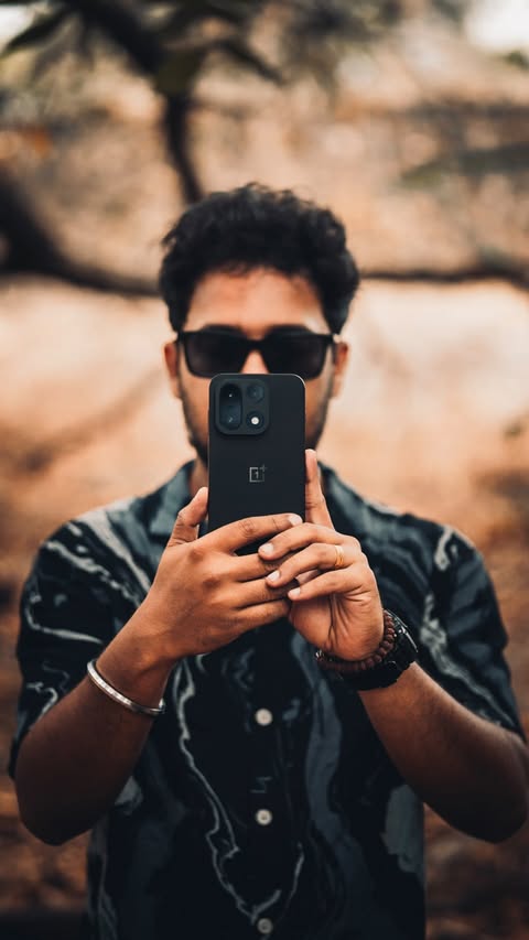 Instagram post by @man_behind_cameras for OnePlus. Caption reads: [...] camera. Photos that hit different. OnePlus....
