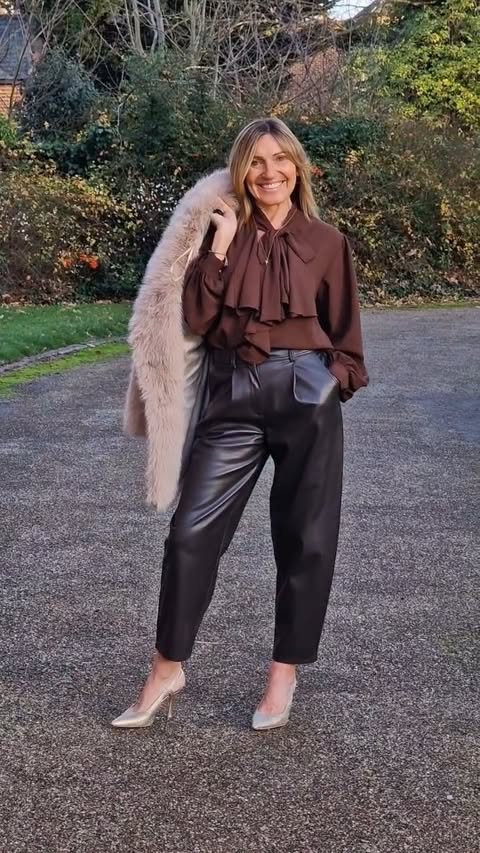 Instagram post by @tracys_fashion_style for Blue Vanilla. Caption reads: [...] pussy bow blouse and faux fur jacket....