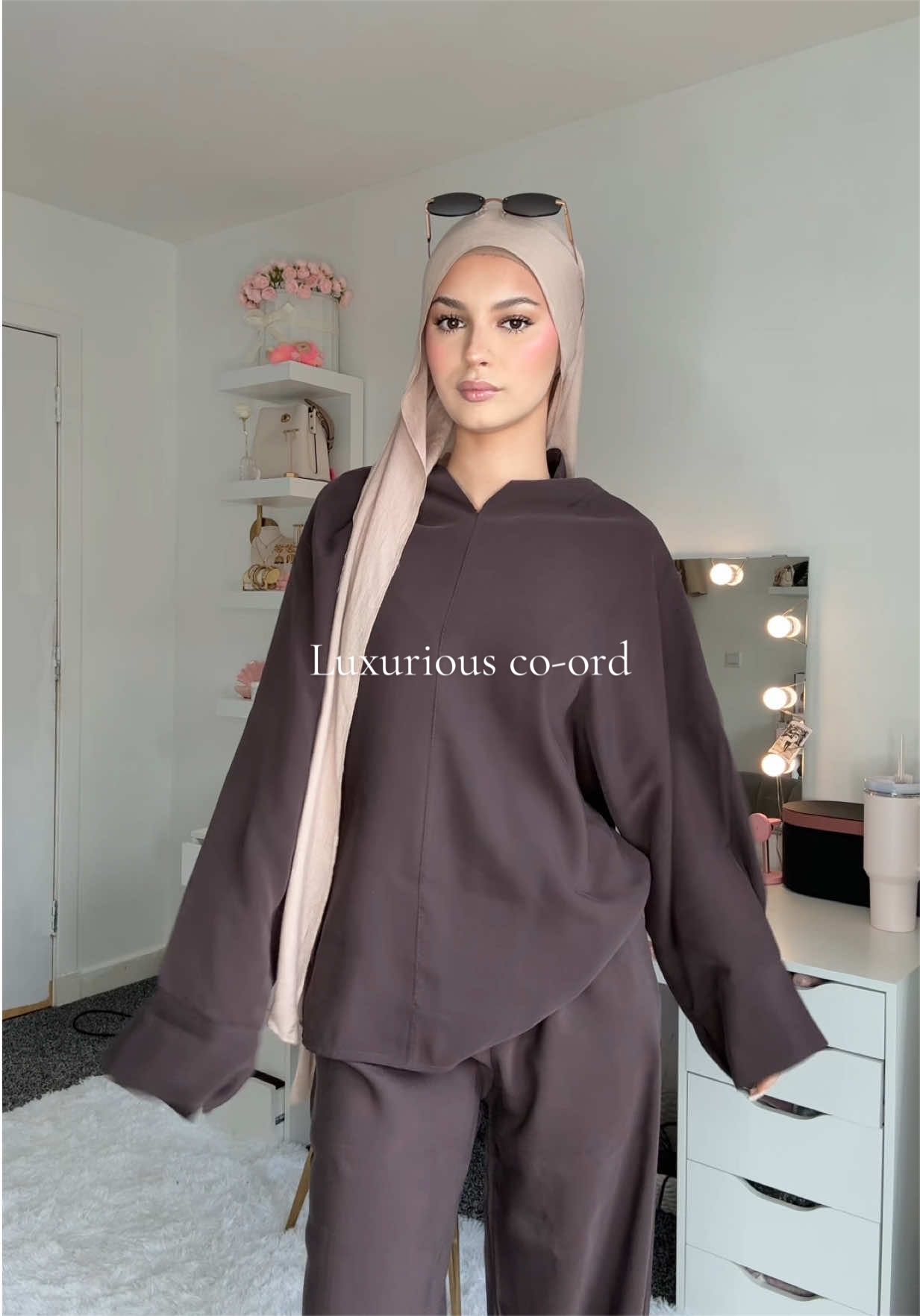 TikTok post by @somaya._xx for emlavish. Caption reads: [...] #hijabifashion #modestfashion #outfit....