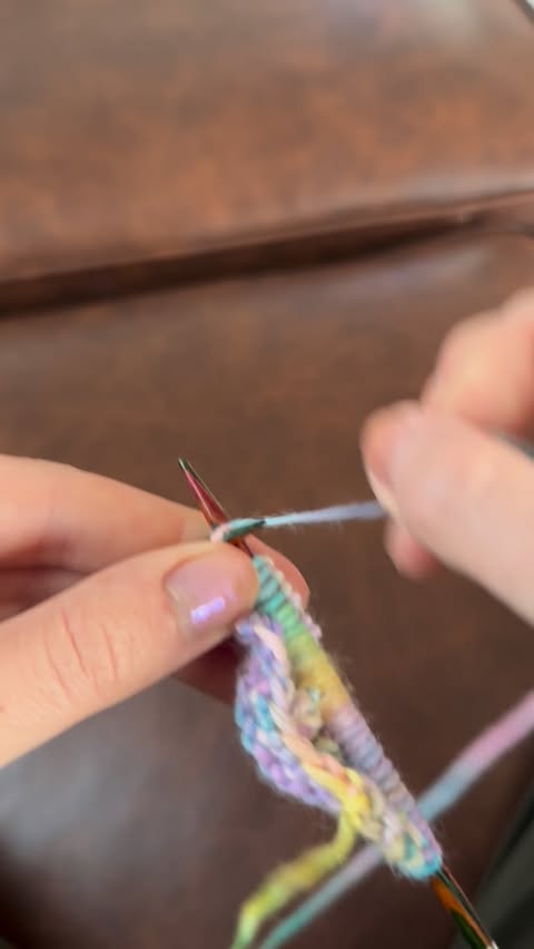 Instagram post by @knitstitchrepeat for Qing Fibre. Caption reads: Using a 20gram ball of dk merino from @qingfibre I....