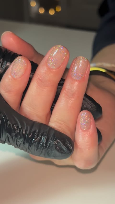 Instagram post by @alyxlippiatt for Bio Sculpture. Caption reads: [...] my fav ✨🪩🌈 Shade - Popping petals....