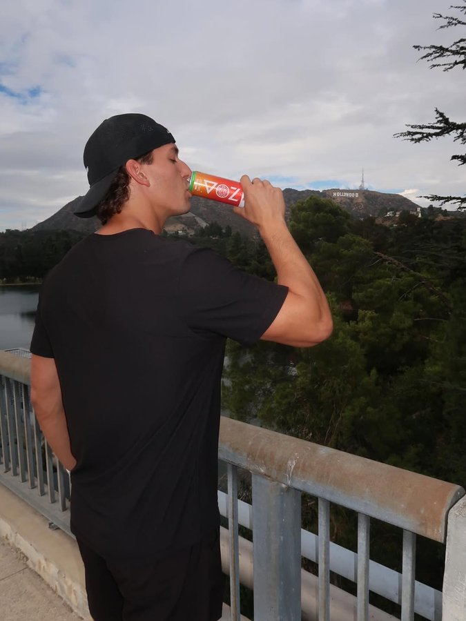 Instagram post by @tannercourtad for ZOA Energy. Caption reads: Fall reset fueled by @zoaenergy - 2 weeks out till....