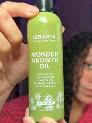 TikTok post by @brandi.reviews for Lebanta Haircare. Caption reads: @Lebanta Haircare #lebanta #lebantagrowthoil [...].