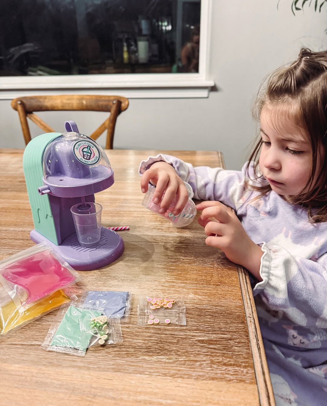 Instagram post by @theblondespaniard for CANAL TOYS. Caption reads: Isla is hard at work inspecting every detail of....