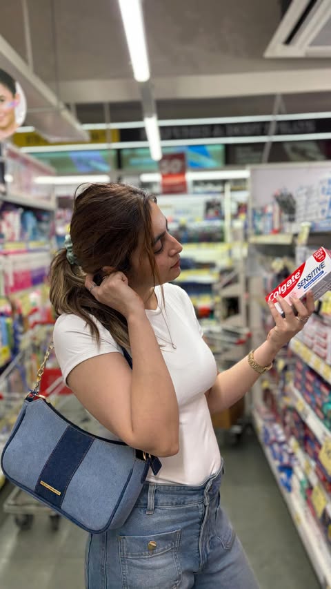 Instagram post by @khushboobarry for Colgate. Caption reads: [...] a quick run, walked out with a steal on....