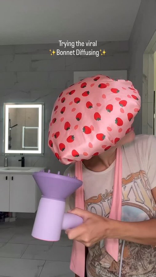 Instagram post by @wavycurly for Laifentech. Caption reads: I’ve tried the net bonnet, hooded bonnet and now…a....