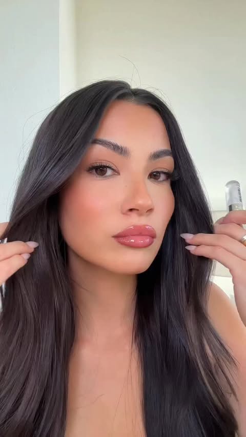 Instagram post by @isarahbutler for Sacheu. Caption reads: THE lip combo to withstand any holiday festivity....