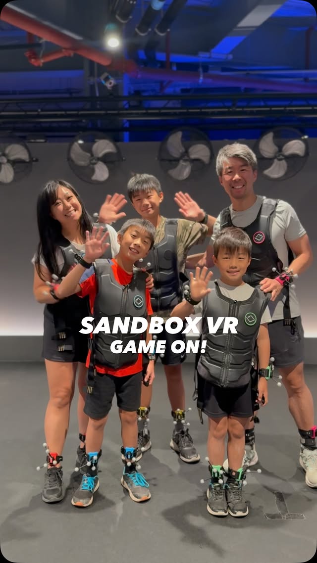 Instagram post by @the_mum_edition for Sandbox VR. Caption reads: [...] imagine and insanely thrilling games -....