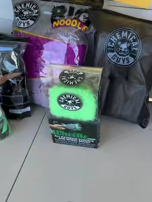 TikTok post by @raisingbabyt for Chemical Guys. Caption reads: The ultimate car guy bundle @Chemical Guys 🚘 🫧.