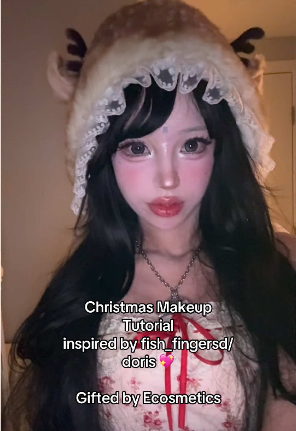 TikTok post by @irisinna for eCosmetics. Caption reads: [...] with fancy aegyo Sal 🎅🏻🎀 gifted by....
