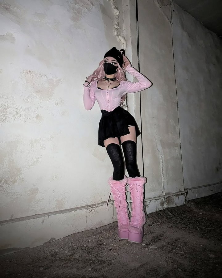 Instagram post by @echo.ally for Demonia Shoes. Caption reads: Idk I think it's cute 🥲🫶🏻
.
.
.
Use code....