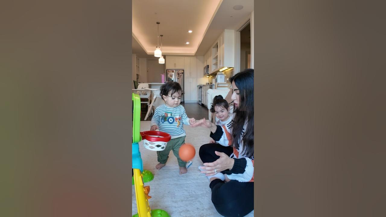 YouTube post by @Rania_Ziki for Momcozy. Caption reads: [...] can’t stand is washing bottles but the....