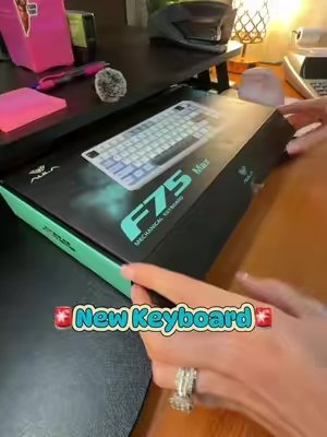 TikTok post by @roswellalien for Aula. Caption reads: Can never go wrong with an @Aula keyboard in your....