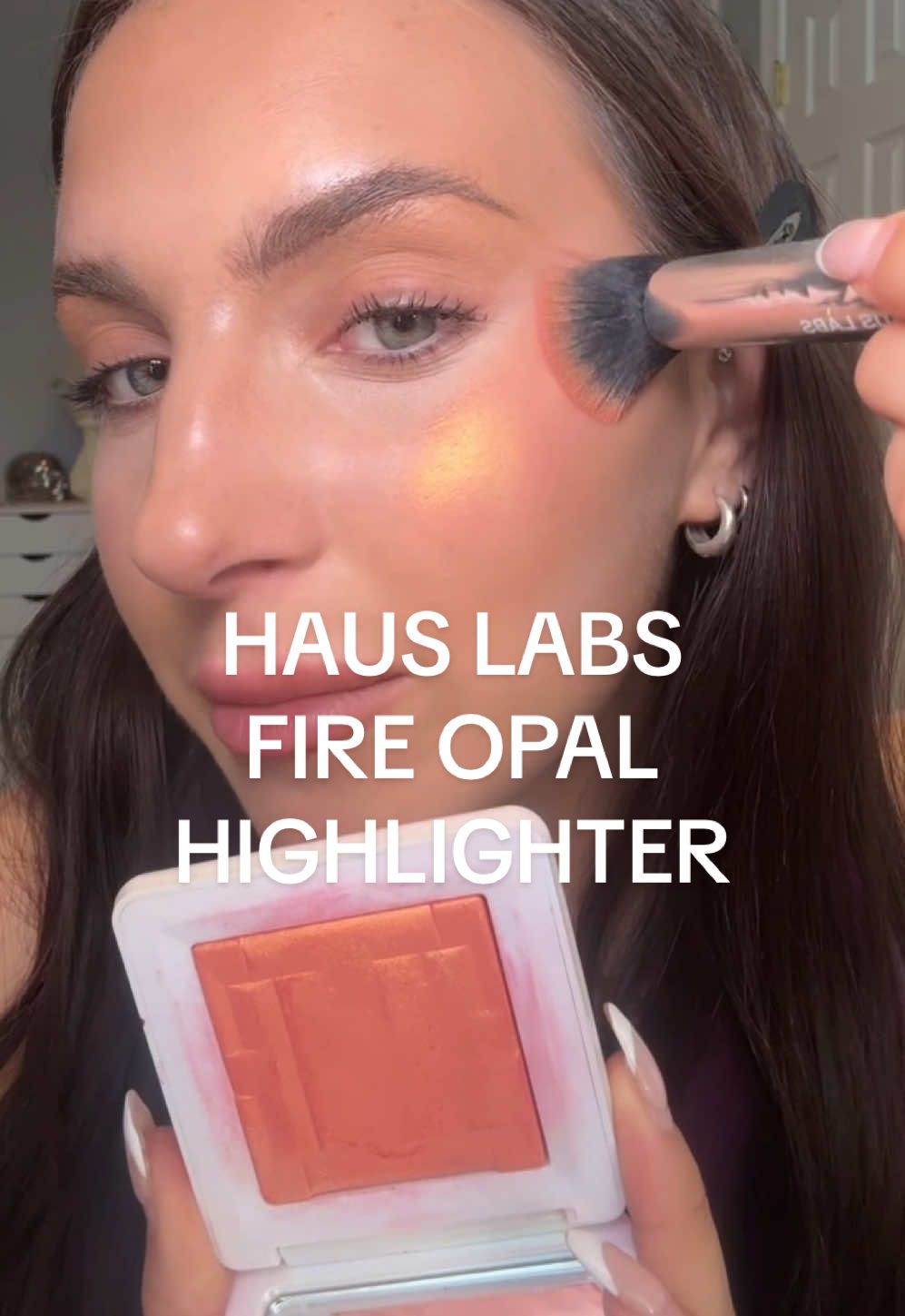 TikTok post by @lexirosenstein for Haus Labs. Caption reads: [...] 🧡 🔥 shade “fire opal” from Haus Labs ✨ gel....