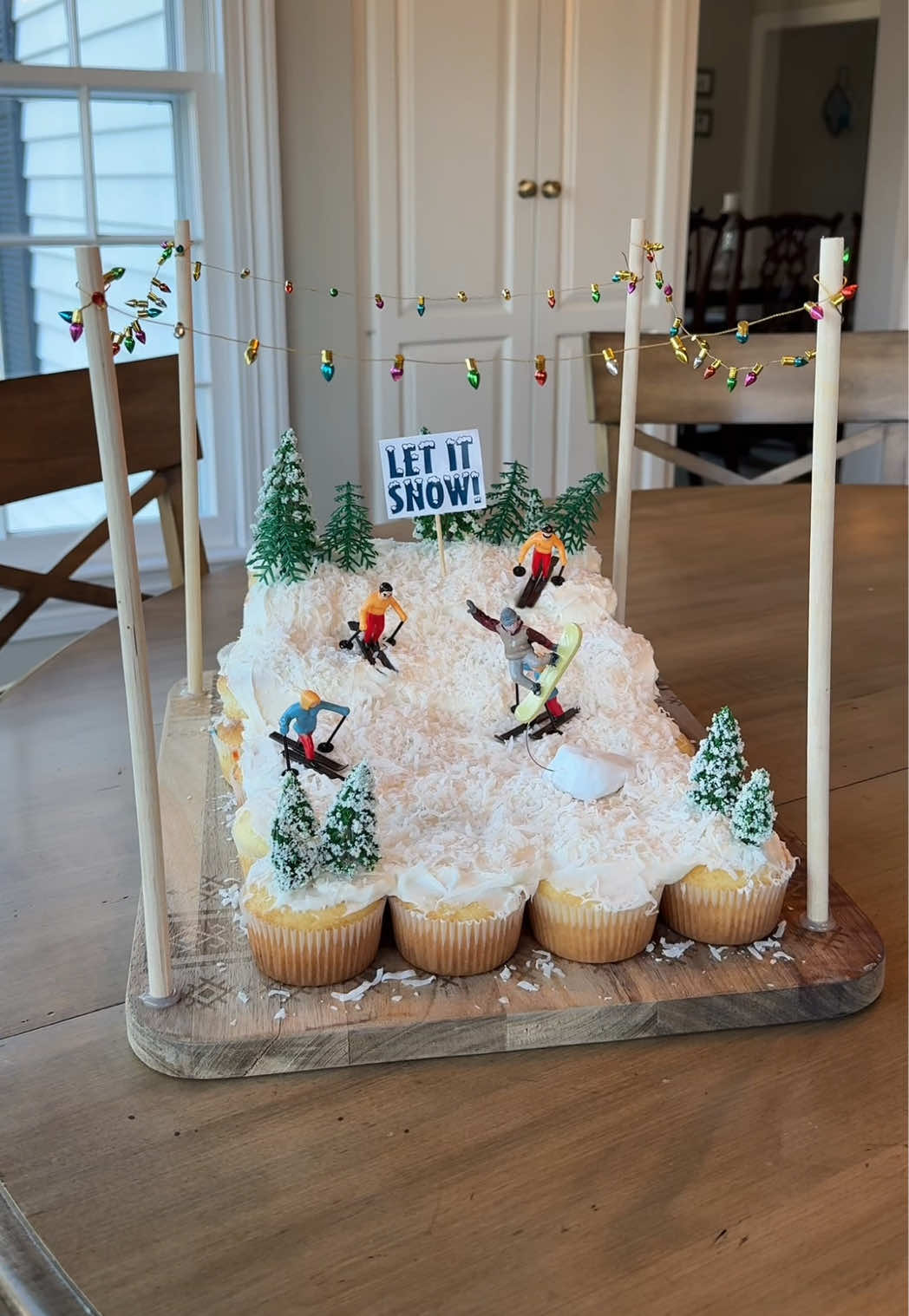 TikTok post by @flipdaddie for Instacart. Caption reads: Cupcake Christmas Ski Village!  I made the perfect....