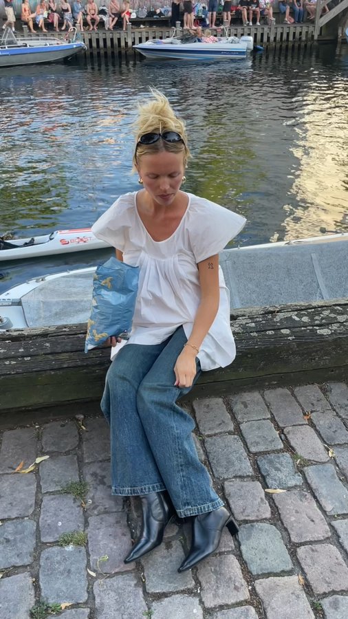 Instagram post by @katarinakrebs for COPENHAGEN STUDIOS. Caption reads: My perfect day in Copenhagen wearing....