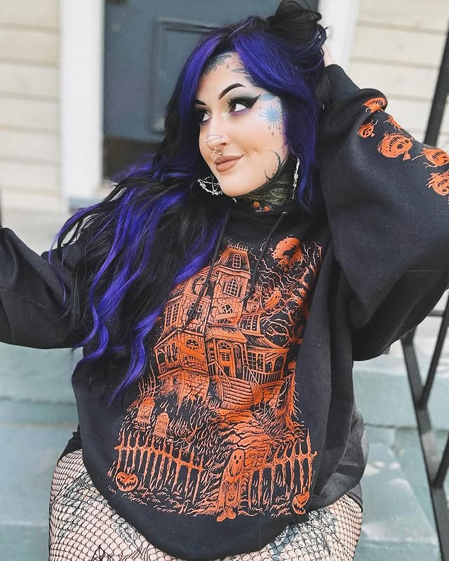 Instagram post by @bluecollargoth for VampireFreaks. Caption reads: [...] hoodie+shorts+fishnet combo 😩🖤 and....