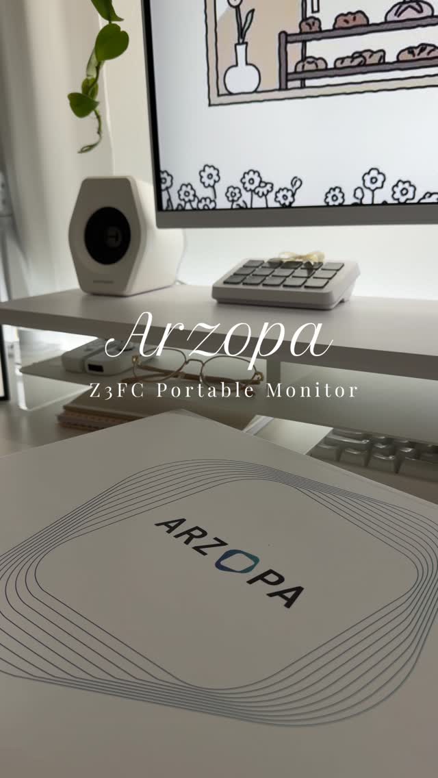 Instagram post by @risascloud for ARZOPA. Caption reads: I’ve been using the Arzopa Z3FC portable monitor....