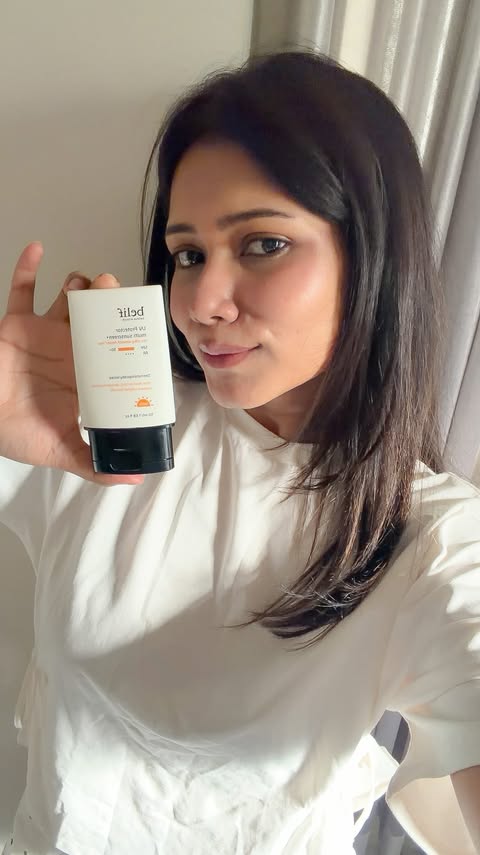 Instagram post by @priyaaxb for belif USA. Caption reads: ✨ summer skin 101 - a solid sunscreen that works,....