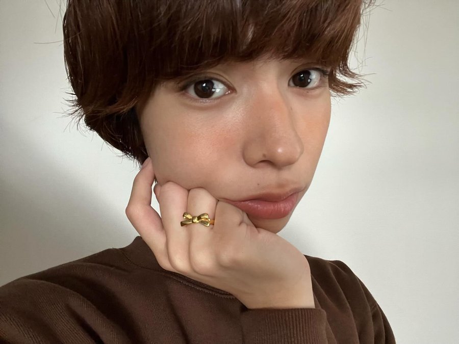 Instagram post by @imnanase for 33club. Caption reads: @33club.jp の Real ribbon ring(mini) 🎀💍 [...].