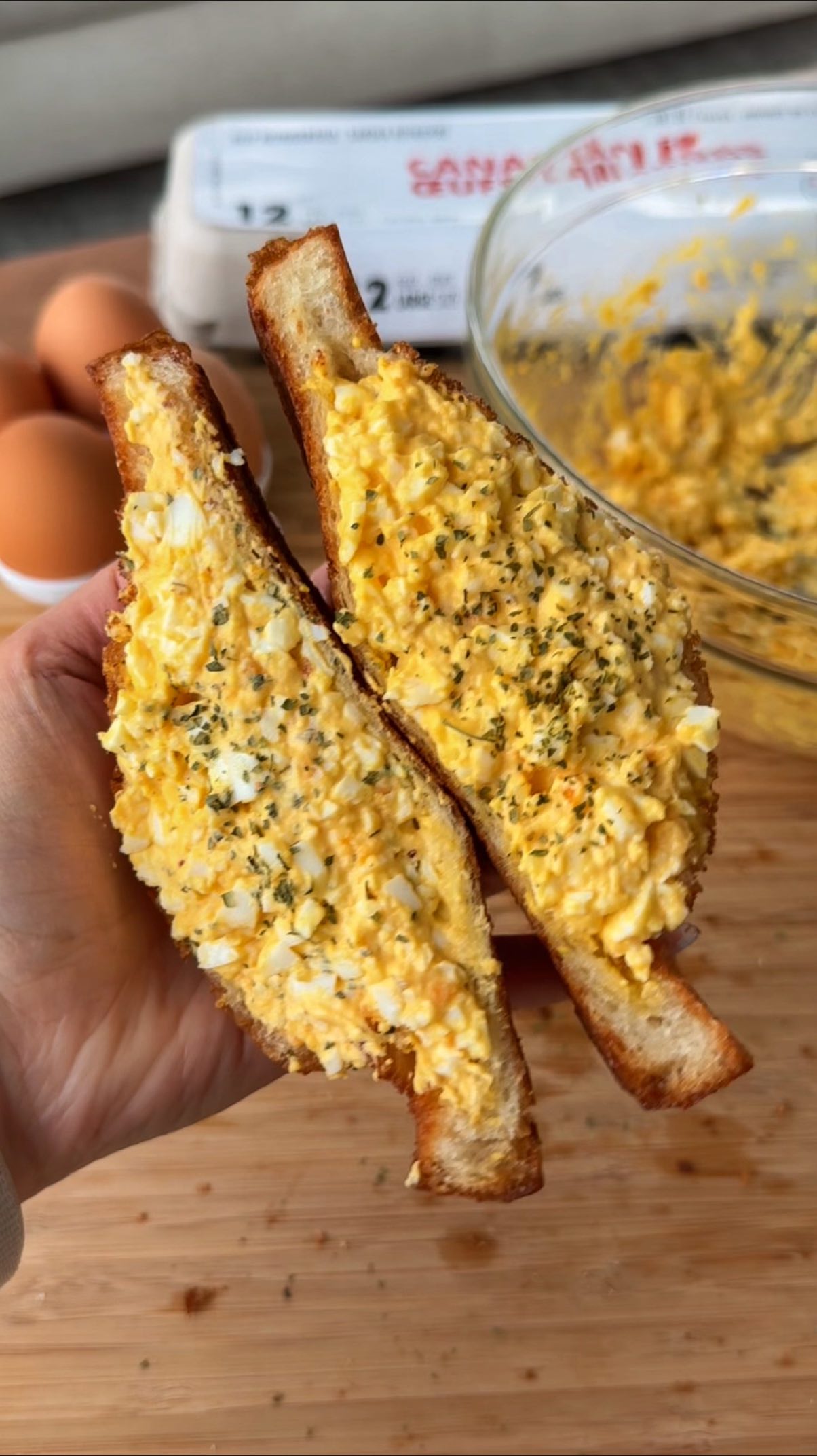 Instagram post by @eatingwithkirby for Get Cracking. Caption reads: #Ad I didn’t think the Japanese Egg Sando could....