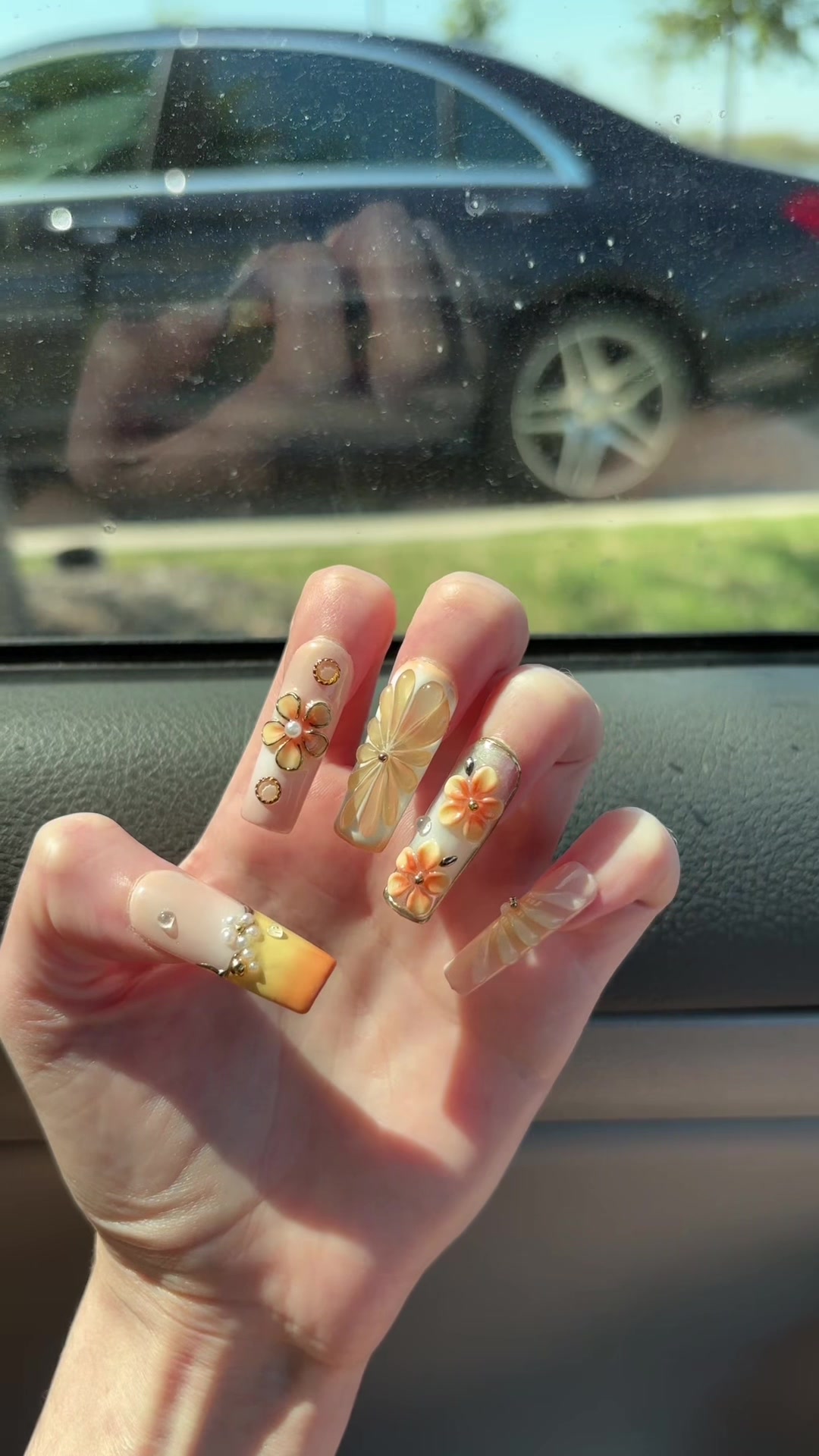 TikTok post by @freckleishface04 for Nailphoria. Caption reads: YESSS 🍊 @Nailphoria #nailphoria #fyp #foryoupage.