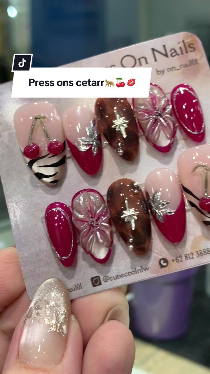 TikTok post by @nn_nail01 for BORN PRETTY. Caption reads: [...] press ons cetarrr💋🍒🐆 Cat eye dri @born....