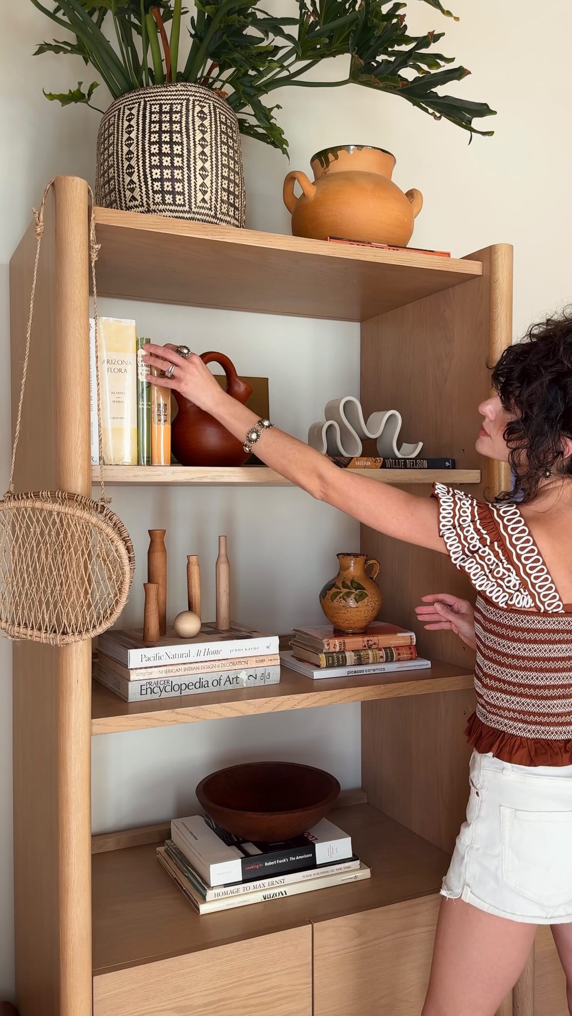 Instagram post by @newdarlings for Article. Caption reads: A den/playroom with organization and style that....