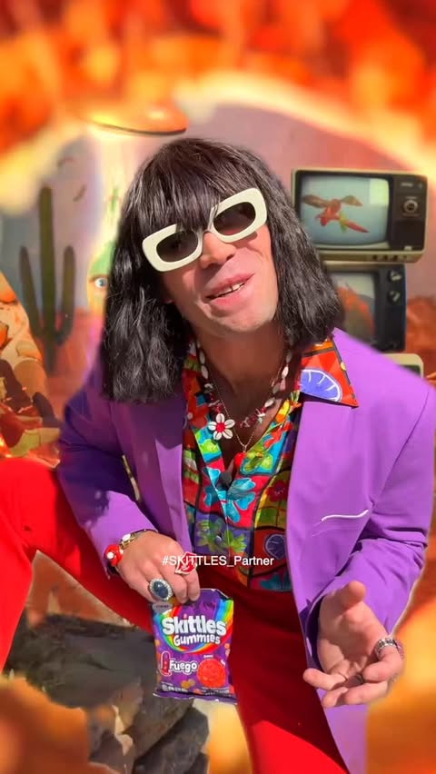Instagram post by @therealmrfantasy for SKITTLES. Caption reads: #SKITTLES_Partner THE @skittles FUEG-HOLE IS [...].