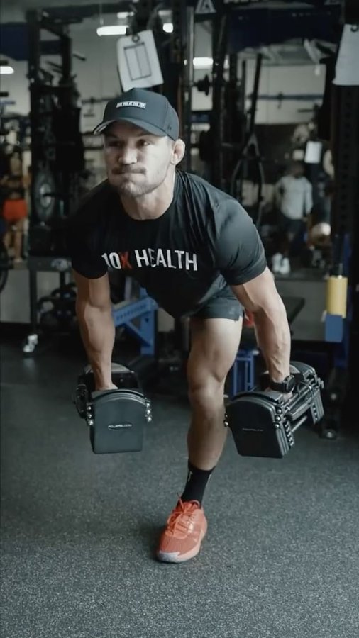 Instagram post by @mikechandlermma for 10x Health System. Caption reads: #workoutoftheday - single leg RDLs are a metaphor....