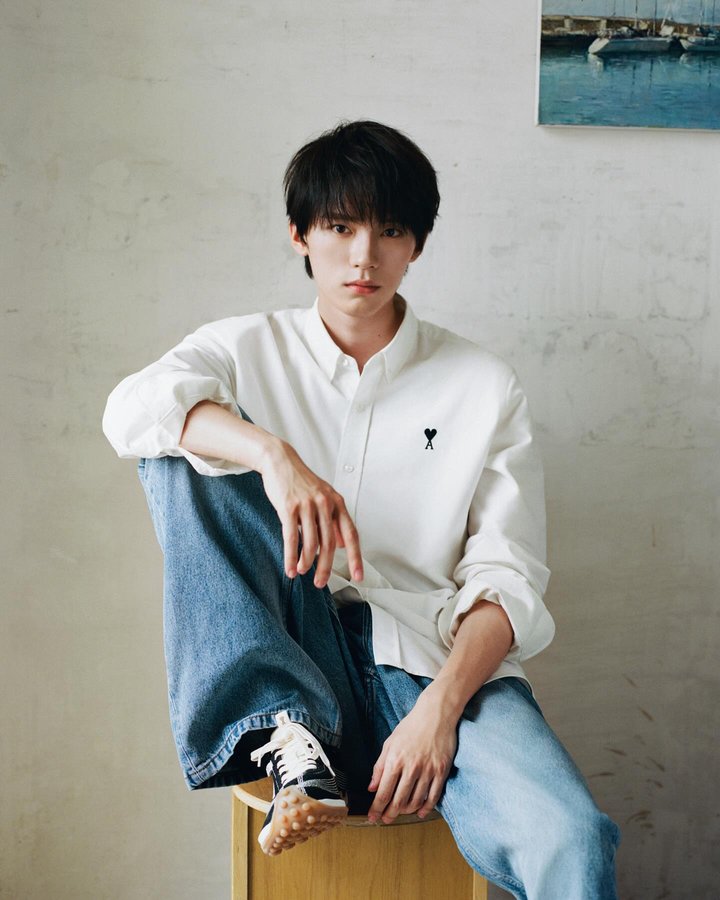 Instagram post by @zrzrzryyy for AMI Paris. Caption reads: [...] with ease and quiet confidence.

#AmiParis....