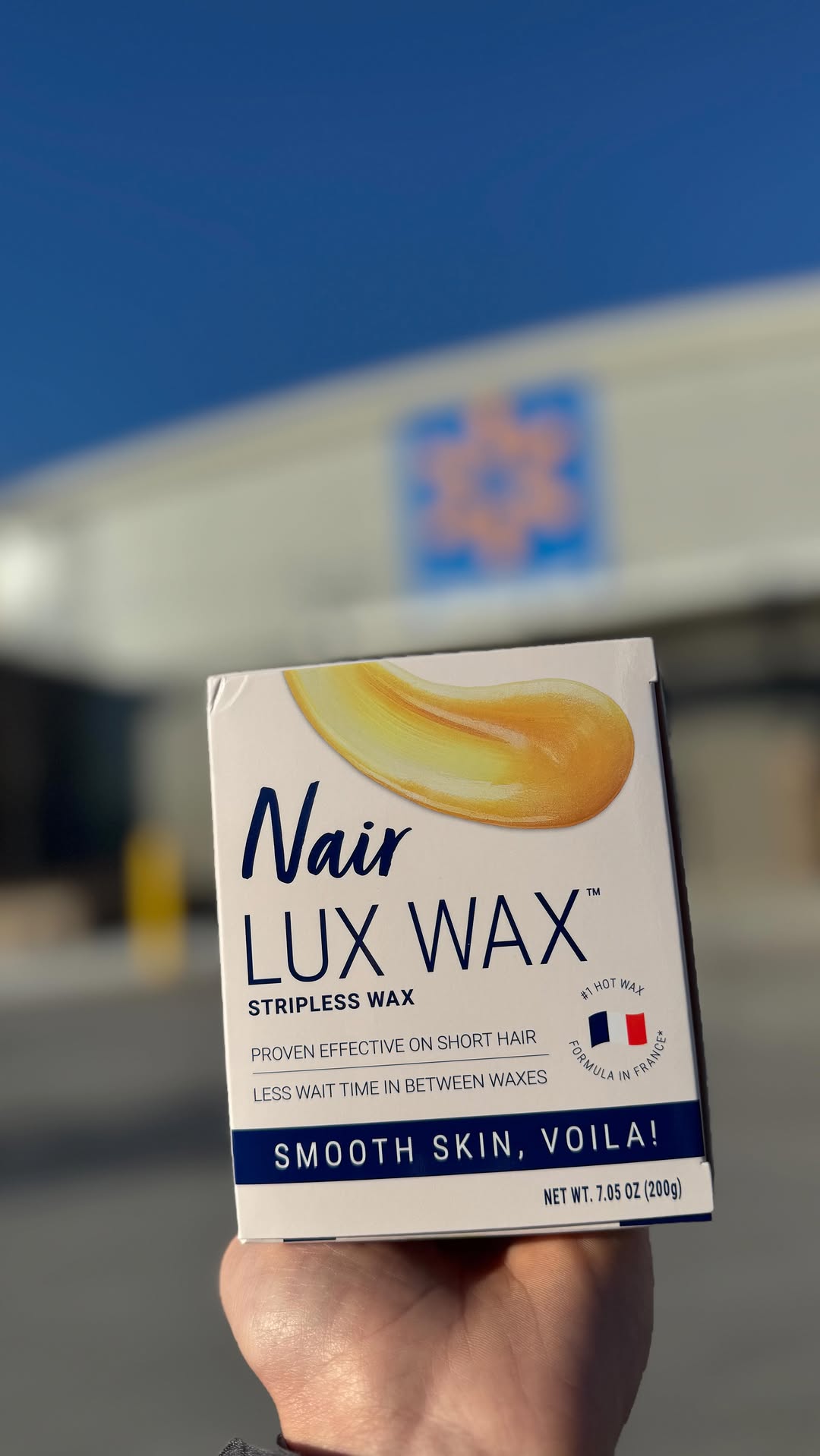 Instagram post by an influencer for Nair. Caption reads: [...] smoothness at home with @NairCare Lux Wax,....