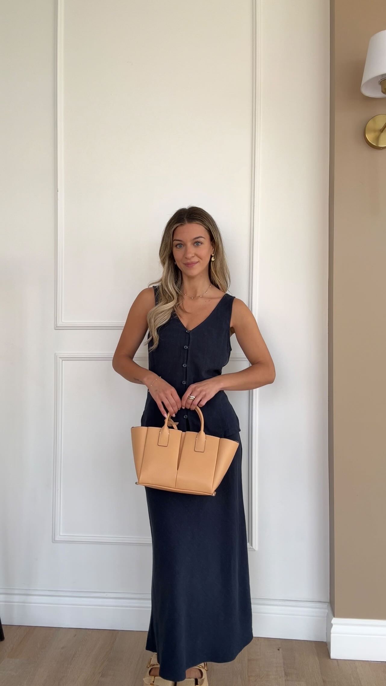 Instagram post by @melvalentini for Gentle Fawn. Caption reads: [...] featuring this navy linen set from....