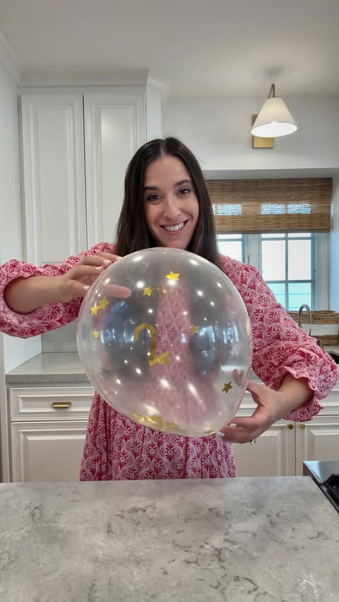 Instagram post by @thebastfam for Dollar Tree. Caption reads: Need a New Year’s Tradition? Try this! 🎈BALLOON....