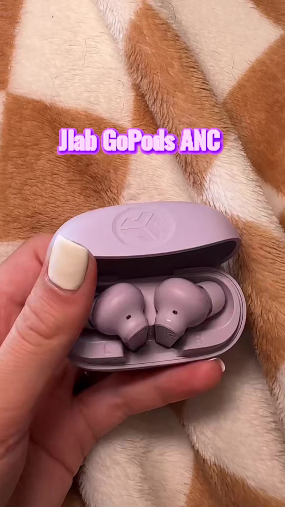 TikTok post by @raisingbabyt for JLab. Caption reads: [...] at your new favorite pods 😍 @JLab....