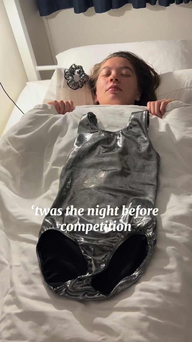 Instagram post by @caitlin.hargraves.music for GK Elite. Caption reads: Our gymnasts are snug as a bug before the....