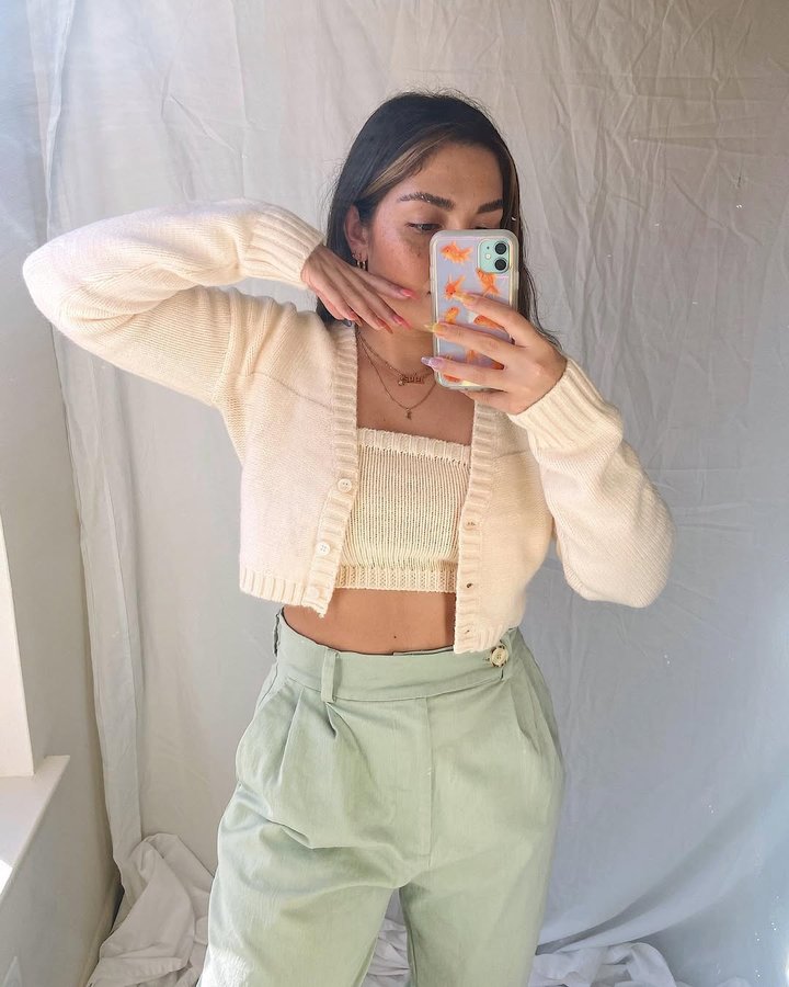 Instagram post by @alllisonmramirez for Sonix. Caption reads: obsessed with cardigan sets + @shopsonix phone....