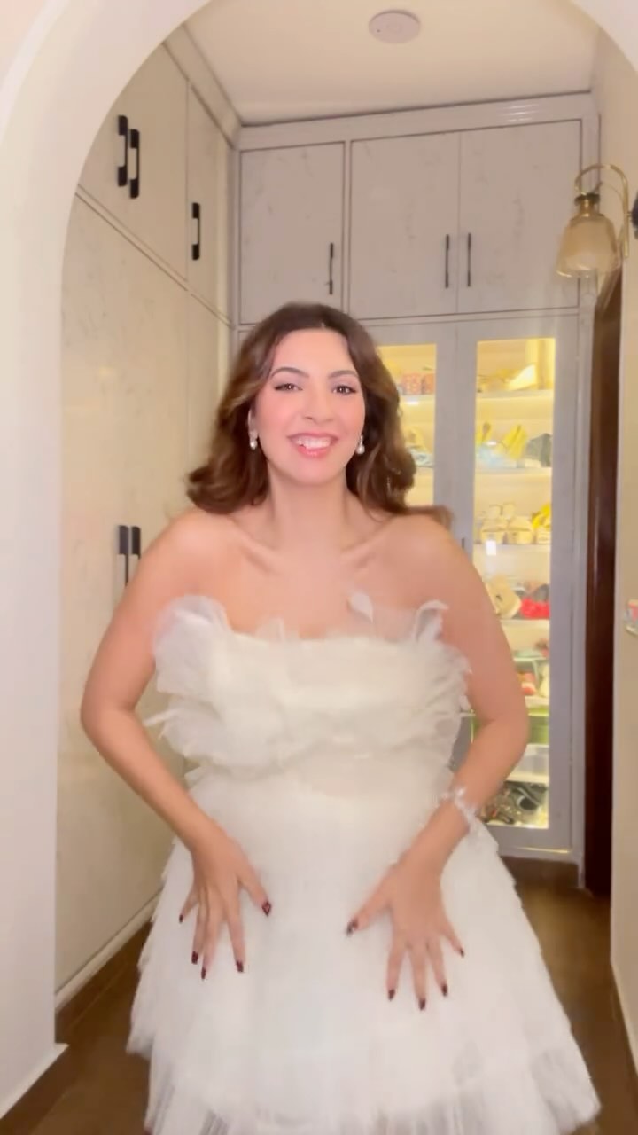 Instagram post by @nikimehra for Mac Duggal. Caption reads: [...] Loveee this feminine, tulle dress from....